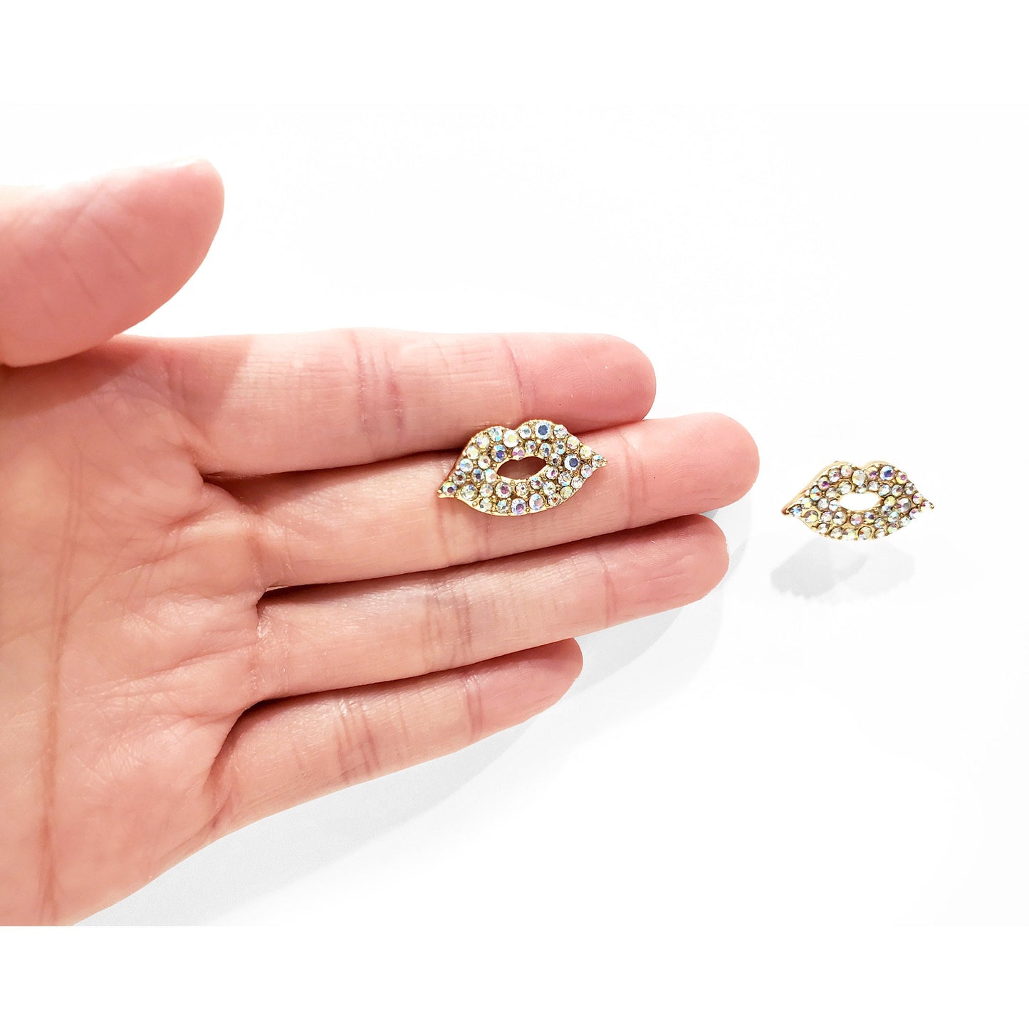 Add playful shine to your look with our Iridescent Lips Earrings—fun, flirty, and perfect for making a statement.