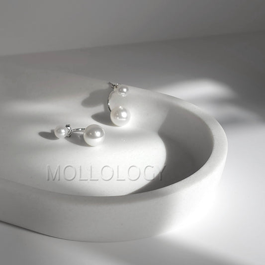 Double Pearl Earrings, handmade jewelry designed to be elegant, meaningful, and beautifully gift ready. These dainty ear jacket earrings add timeless charm to any look, featuring a modern wrap-behind design that gently curves behind the earlobe. Perfect for weddings, bridal styling, holidays, birthdays, anniversaries, or everyday wear, their soft luminous glow brings a classic yet contemporary feel to every outfit.