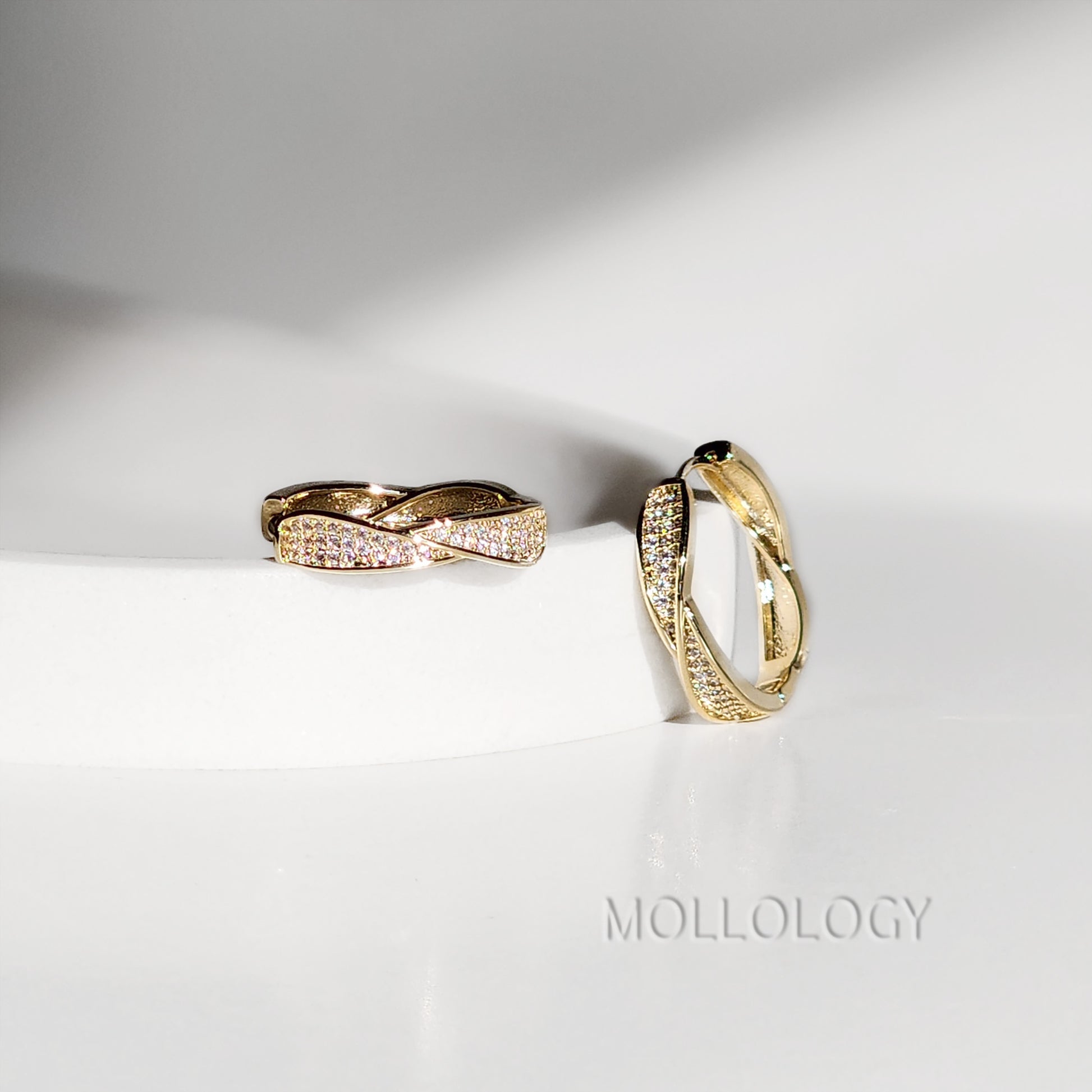 twisted pave earring
