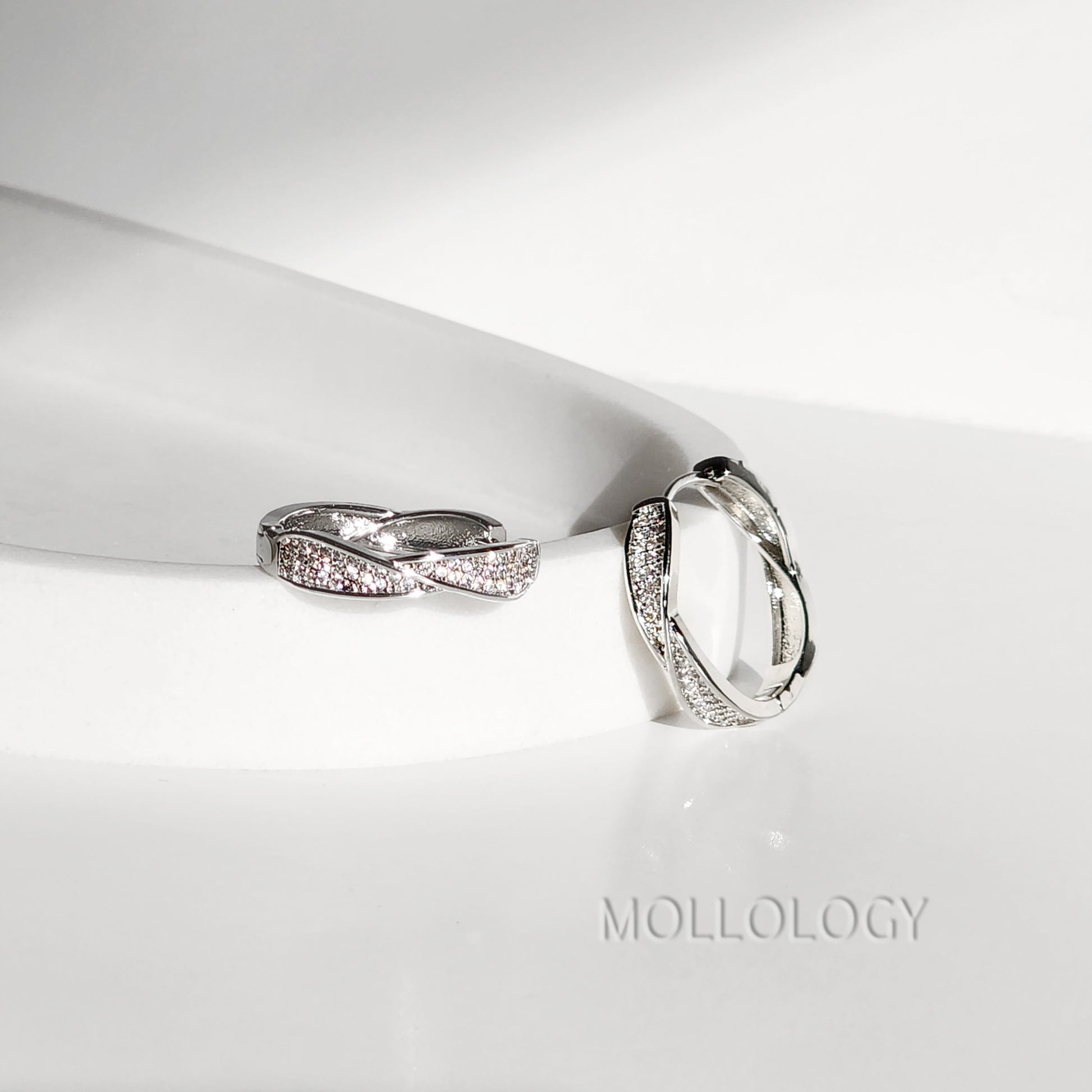 twisted pave earring