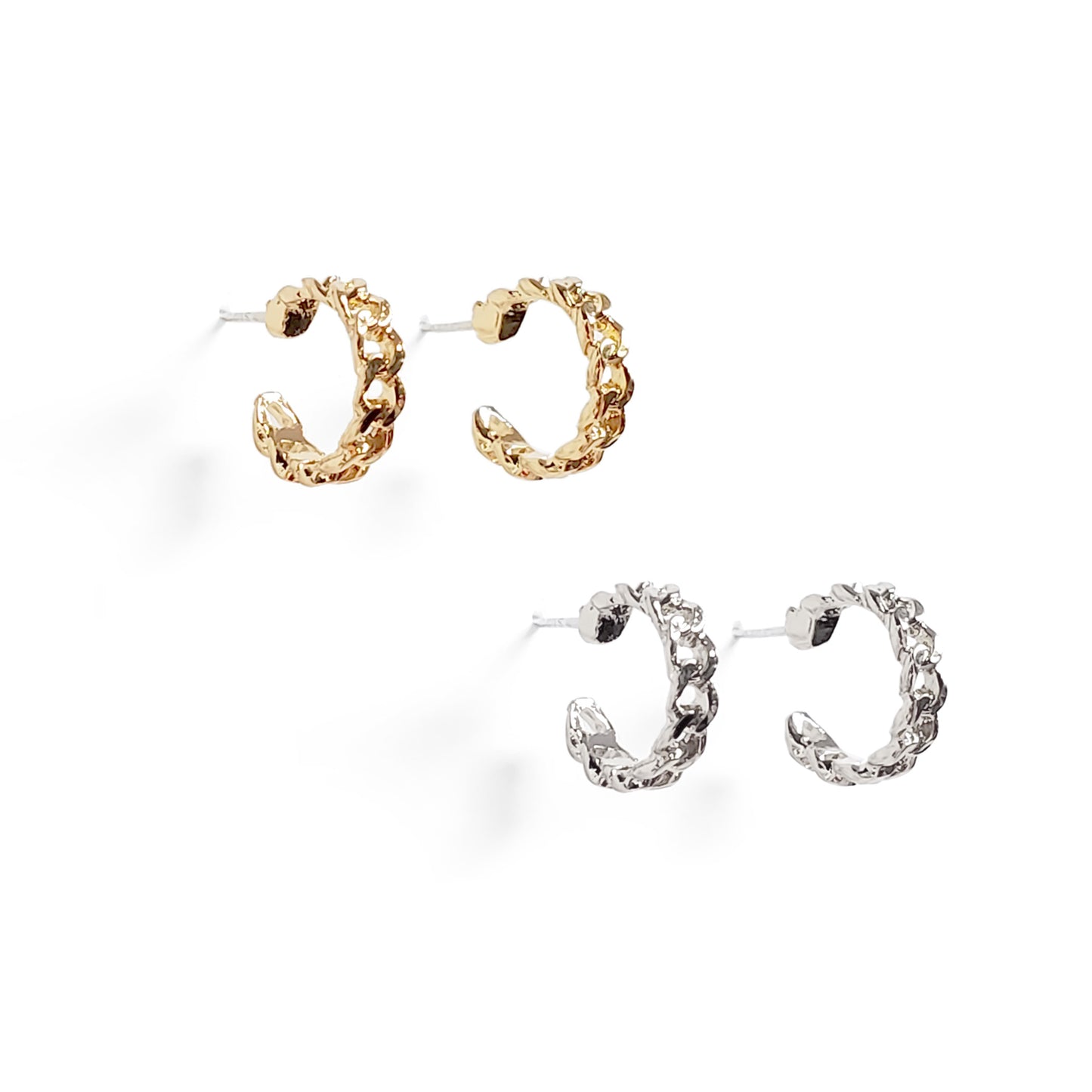 Small gold and silver chainlink huggie earrings displayed on a white background.