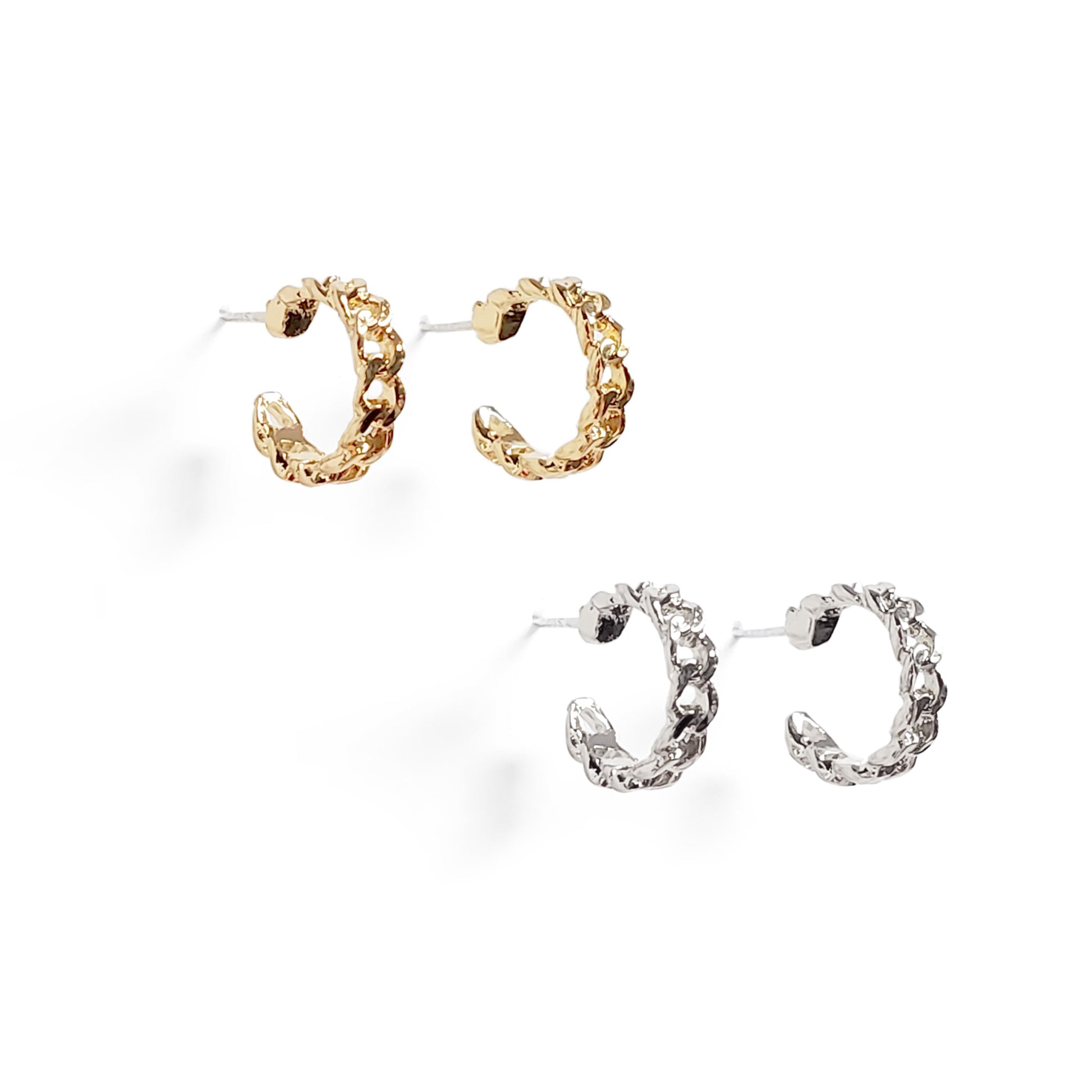 Small gold and silver chainlink huggie earrings displayed on a white background.