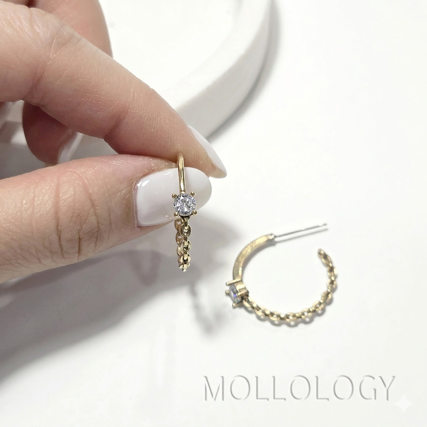 Gold chain hoop earrings with CZ stone on white background, minimalist MOLLOLOGY hoop earring product image.