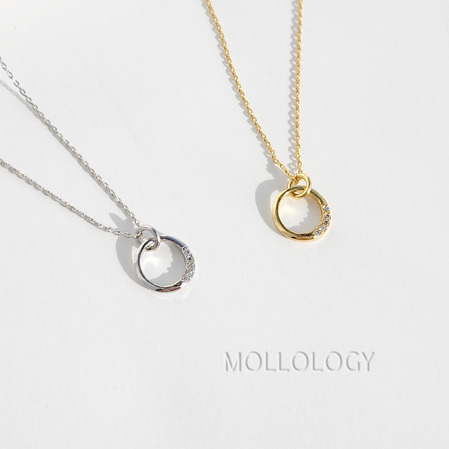 This Dainty Circle Necklace is a timeless symbol of unity, eternity, and effortless style. Handcrafted with care, it features a delicate open circle pendant accented with sparkling pave cubic zirconia perfect for everyday wear, layering, or gifting. A meaningful choice for girlfriends, wives, moms, or anyone who loves minimalist jewelry. Includes a free note card upon request and fast shipping.