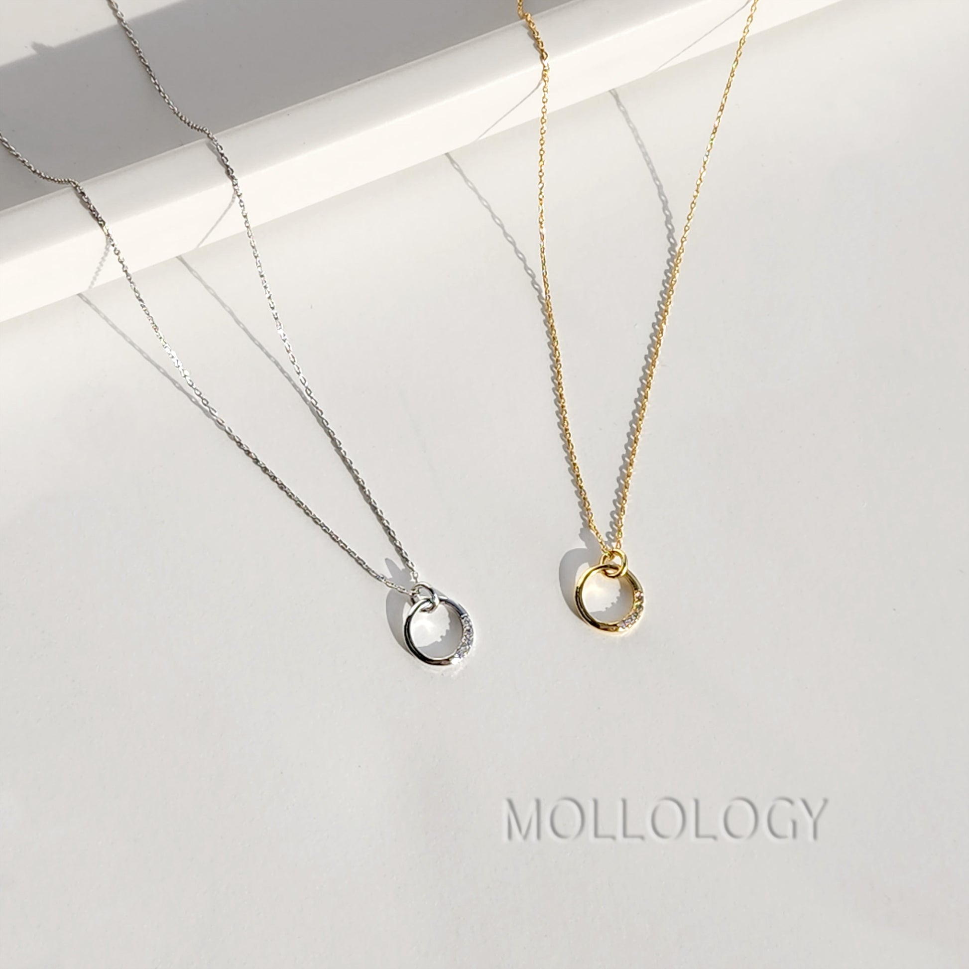 This Dainty Circle Necklace is a timeless symbol of unity, eternity, and effortless style. Handcrafted with care, it features a delicate open circle pendant accented with sparkling pave cubic zirconia perfect for everyday wear, layering, or gifting. A meaningful choice for girlfriends, wives, moms, or anyone who loves minimalist jewelry. Includes a free note card upon request and fast shipping.