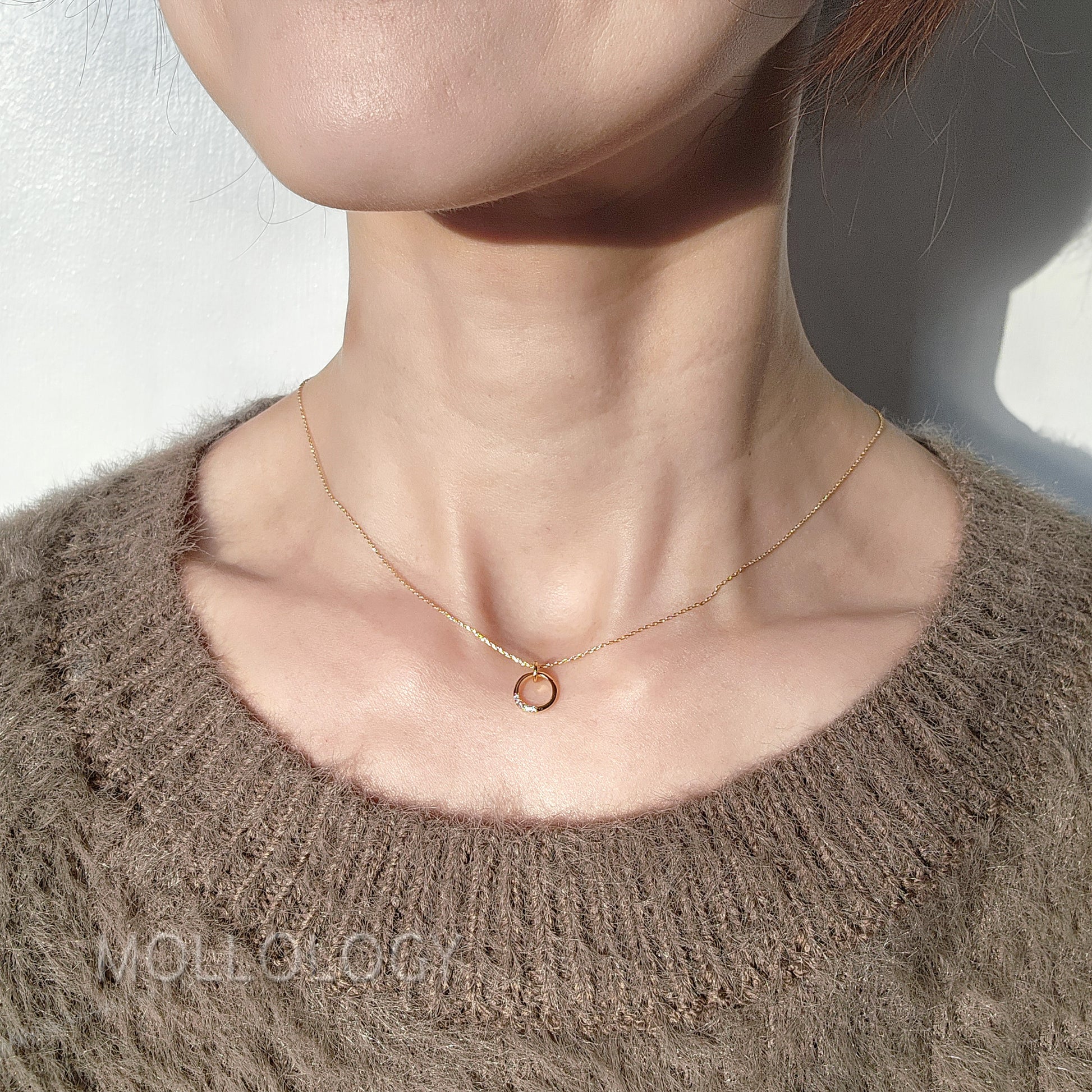 This Dainty Circle Necklace is a timeless symbol of unity, eternity, and effortless style. Handcrafted with care, it features a delicate open circle pendant accented with sparkling pave cubic zirconia perfect for everyday wear, layering, or gifting. A meaningful choice for girlfriends, wives, moms, or anyone who loves minimalist jewelry. Includes a free note card upon request and fast shipping.