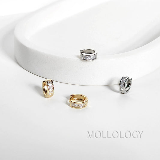 Gold Baguette and Pave Huggie Hoop Earrings front view
