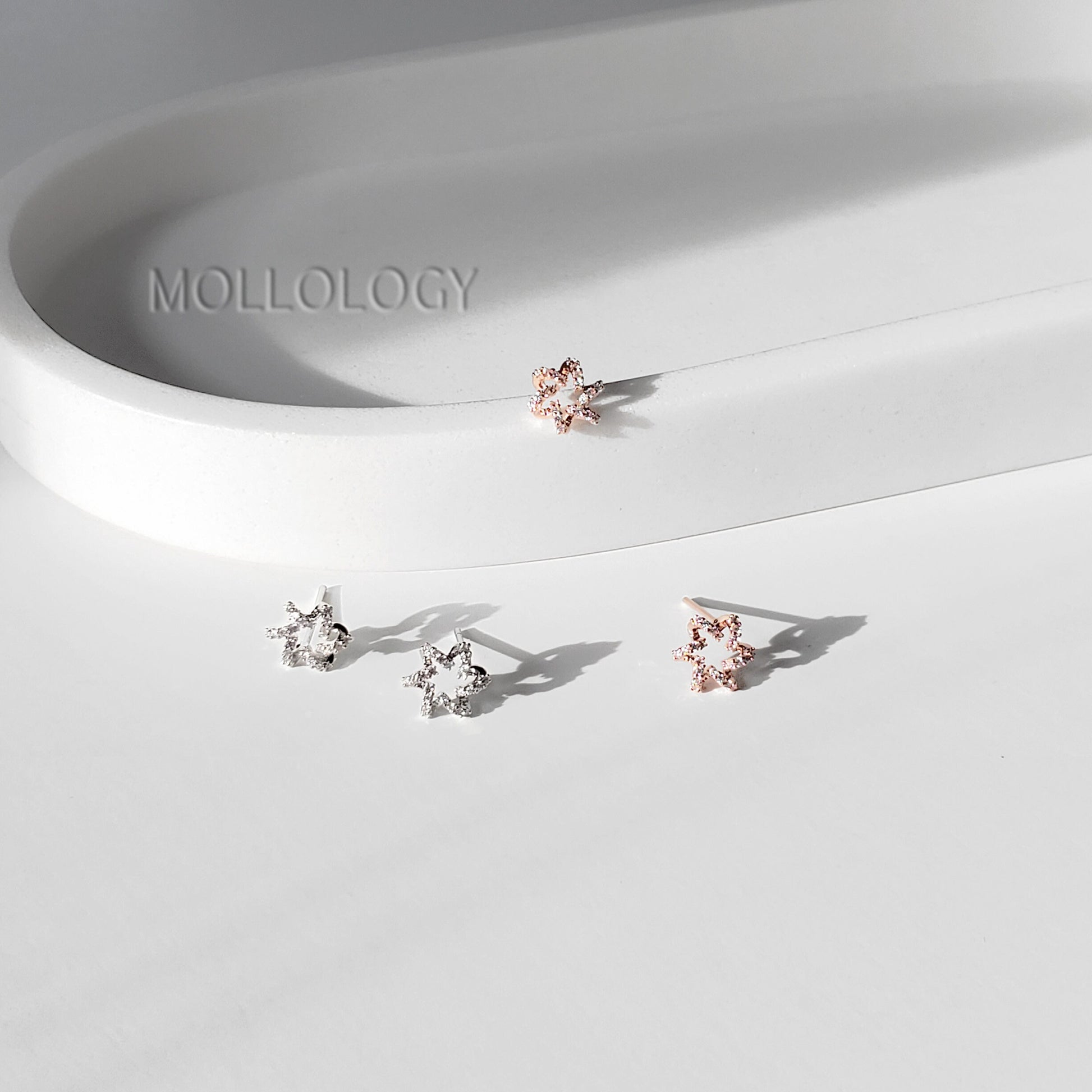 These dainty starburst floral earrings feature a delicate flower-inspired design with sparkling CZ, available in gold or silver for a soft, feminine look. Perfect as everyday dainty studs or special-occasion jewelry, they work beautifully as bridesmaids earrings, flower girl earrings, or wedding guest accessories. Lightweight and comfortable, these floral earrings make a sweet gift for her for birthdays, holidays, and celebrations.