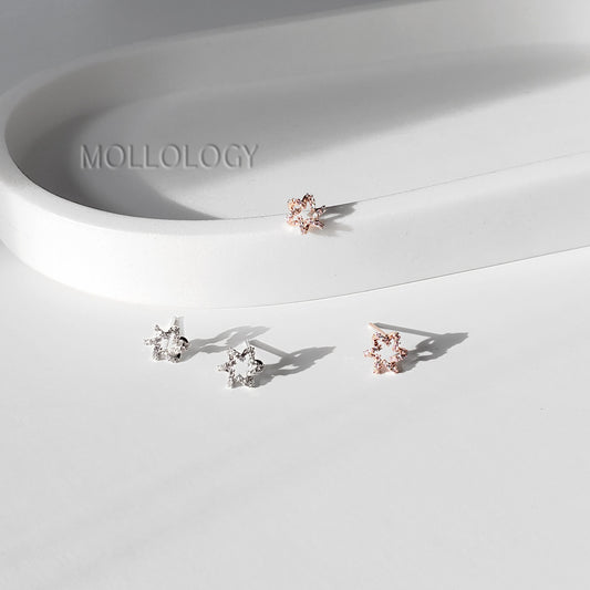 These dainty starburst floral earrings feature a delicate flower-inspired design with sparkling CZ, available in gold or silver for a soft, feminine look. Perfect as everyday dainty studs or special-occasion jewelry, they work beautifully as bridesmaids earrings, flower girl earrings, or wedding guest accessories. Lightweight and comfortable, these floral earrings make a sweet gift for her for birthdays, holidays, and celebrations.