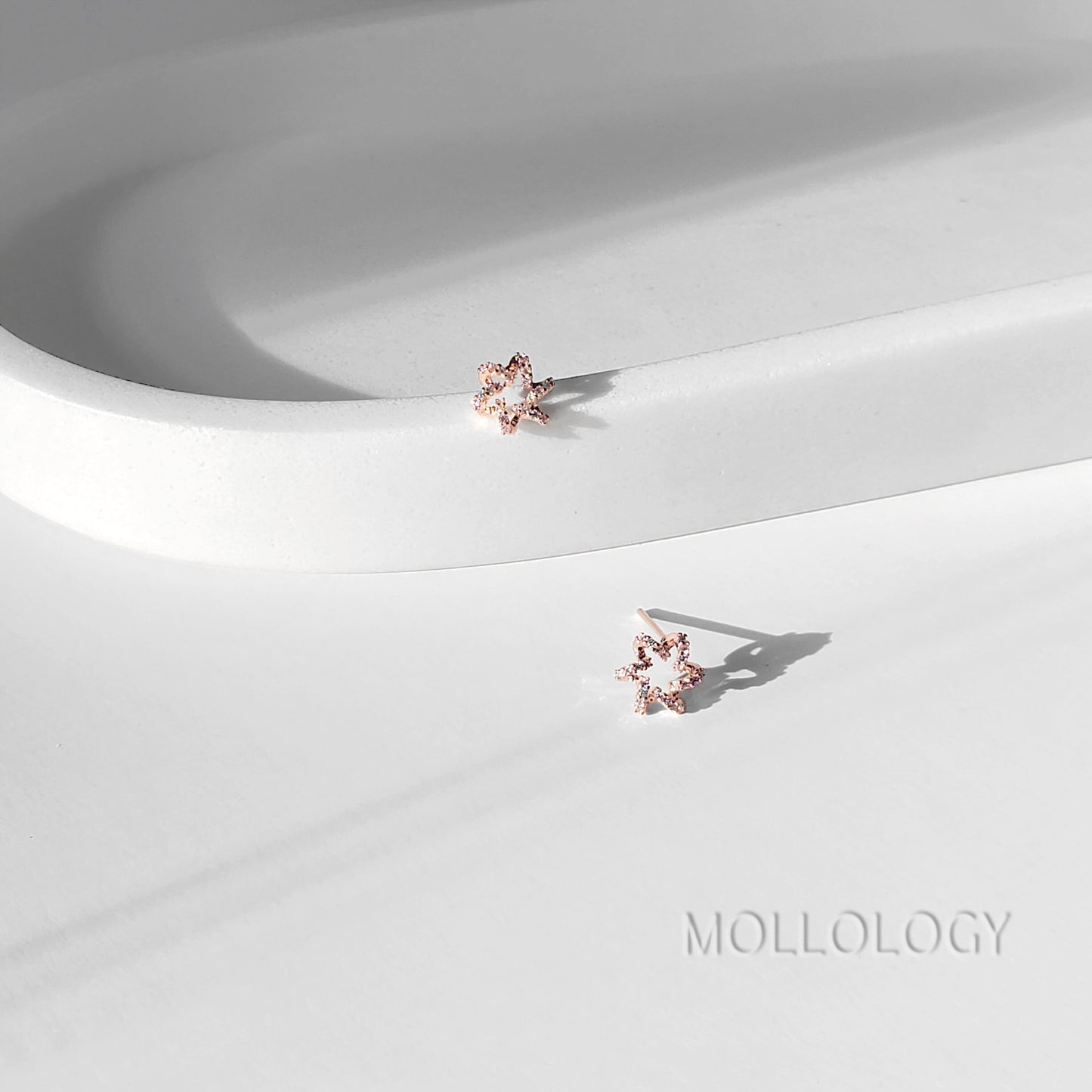These dainty starburst floral earrings feature a delicate flower-inspired design with sparkling CZ, available in gold or silver for a soft, feminine look. Perfect as everyday dainty studs or special-occasion jewelry, they work beautifully as bridesmaids earrings, flower girl earrings, or wedding guest accessories. Lightweight and comfortable, these floral earrings make a sweet gift for her for birthdays, holidays, and celebrations.