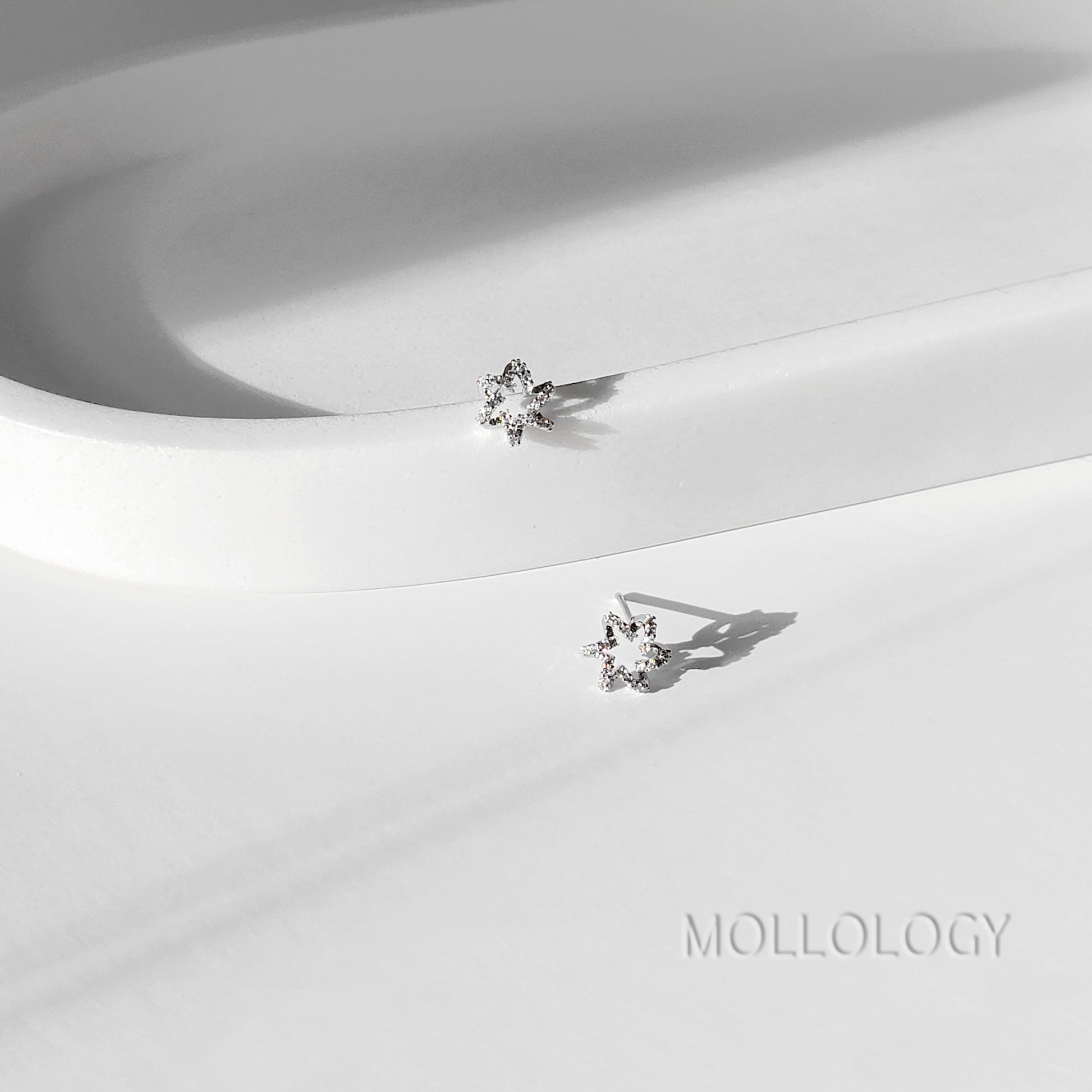 These dainty starburst floral earrings feature a delicate flower-inspired design with sparkling CZ, available in gold or silver for a soft, feminine look. Perfect as everyday dainty studs or special-occasion jewelry, they work beautifully as bridesmaids earrings, flower girl earrings, or wedding guest accessories. Lightweight and comfortable, these floral earrings make a sweet gift for her for birthdays, holidays, and celebrations.