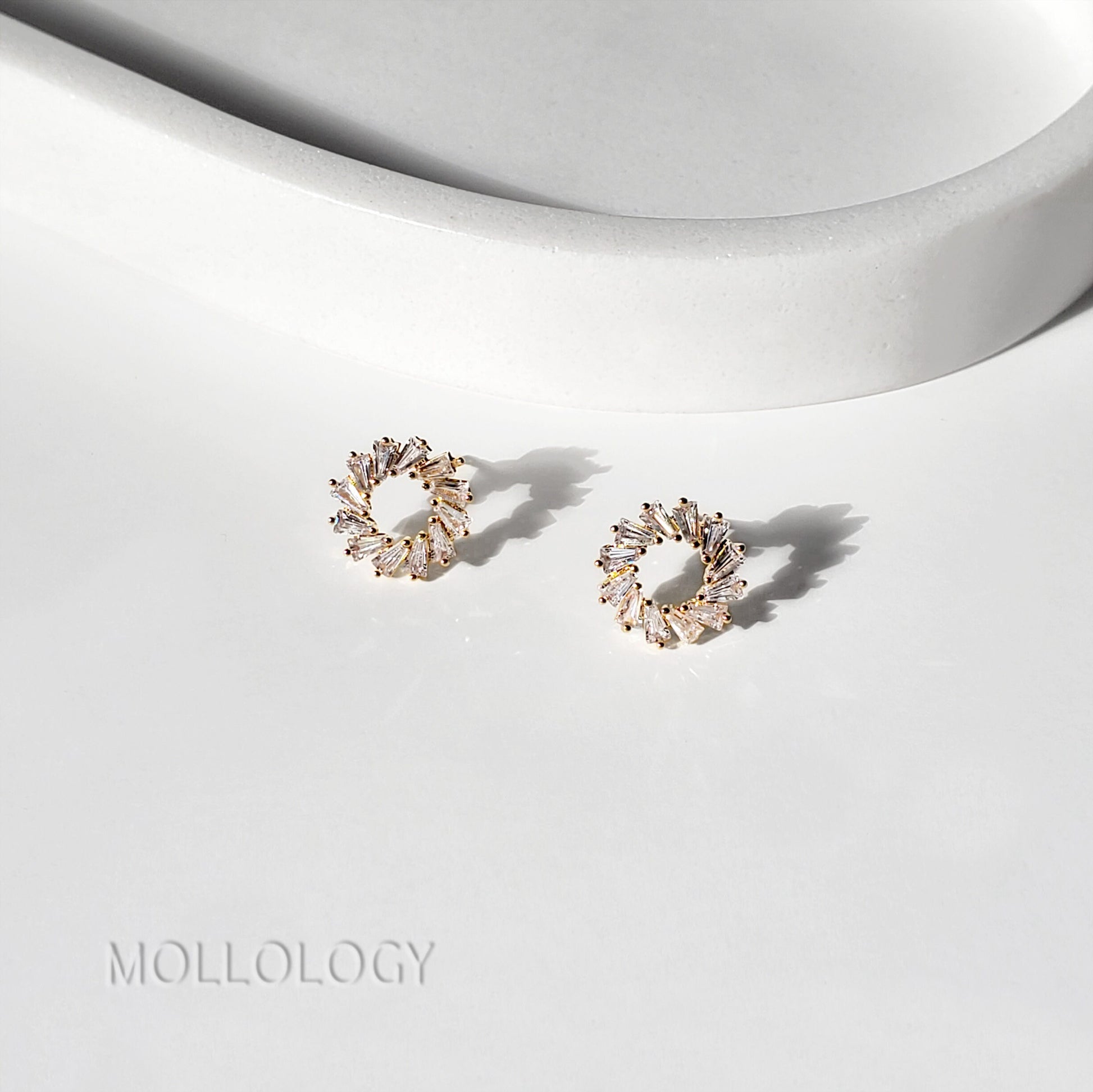 Handmade sunburst CZ baguette earrings in dainty gold or white gold, perfect for bridal, bridesmaids, and everyday wear. Elegant mid century–inspired fan and floral earrings that make a beautiful jewelry gift for her for holidays, birthdays, anniversaries, or Valentine’s Day.