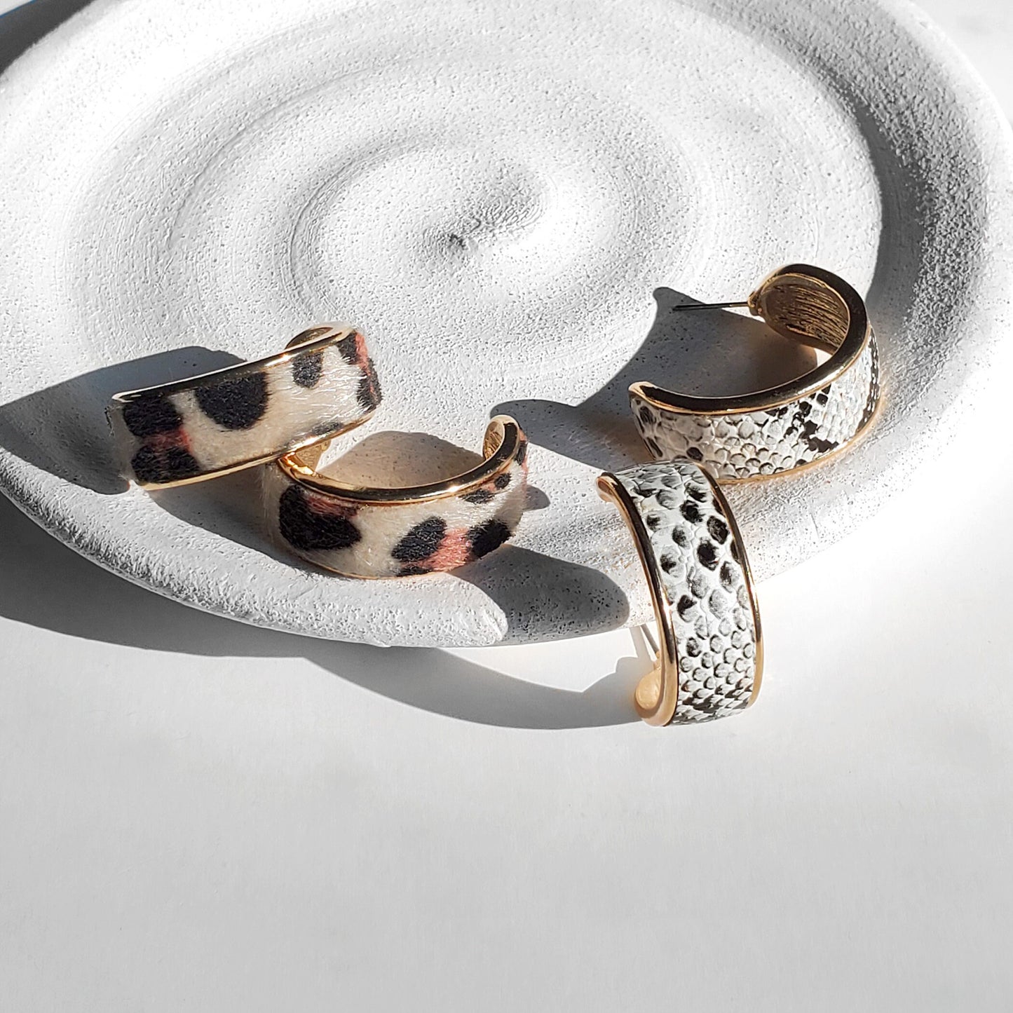 chunky gold hoops, hoop earrings, animal print, leather hoops, statement earrings