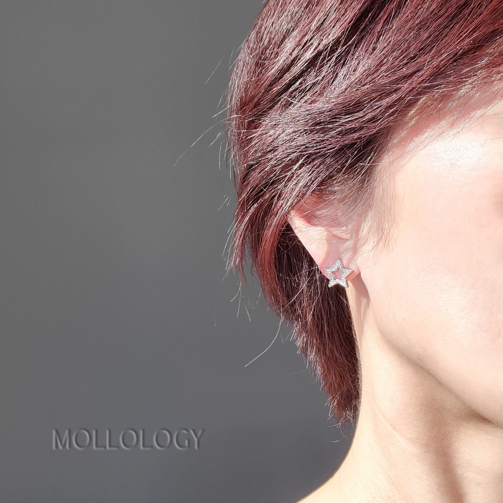 These dainty CZ star earrings feature a chic open star design with baguette details in shiny silver, creating modern celestial earrings that catch the light beautifully. Ideal as everyday star stud earrings or special-occasion jewelry, they are lightweight, comfortable, and perfect for stacking with other dainty silver earrings. Lovely as bridal and bridesmaids earrings, these star earrings make a thoughtful gift for her for birthdays, holidays, or weddings.