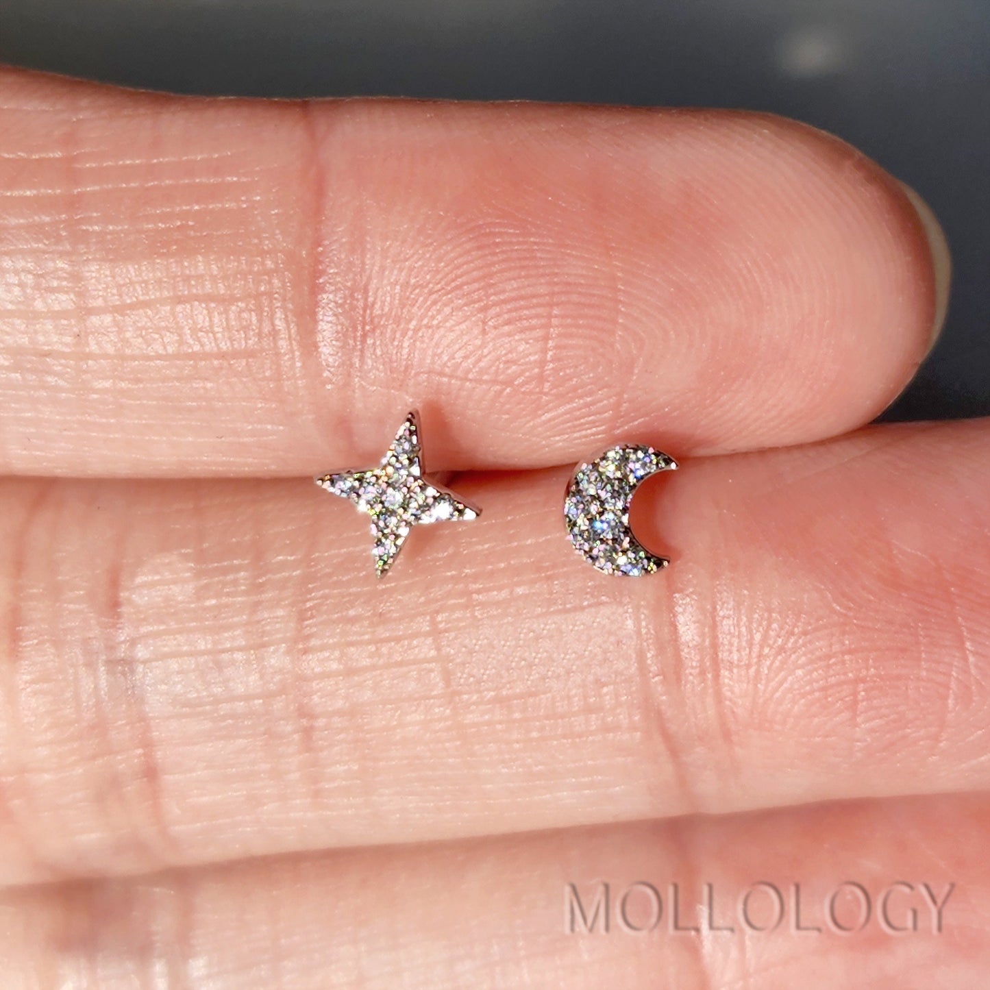These Tiny Star Moon Earrings feature petite crescent moon and star studs with pavé CZ, creating a minimalist look that still catches the light. Designed for everyday wear, these tiny stud earrings are lightweight, comfortable, and perfect for second piercings or delicate stacking.

These dainty star moon earrings make a sweet gift for her for birthdays, holidays, or just because. Ideal for anyone who loves minimalist earrings, celestial jewelry, and tiny studs with a subtle touch of sparkle.
