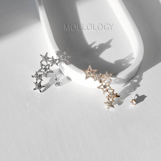 Star ear climber and diamond stud in silver and gold