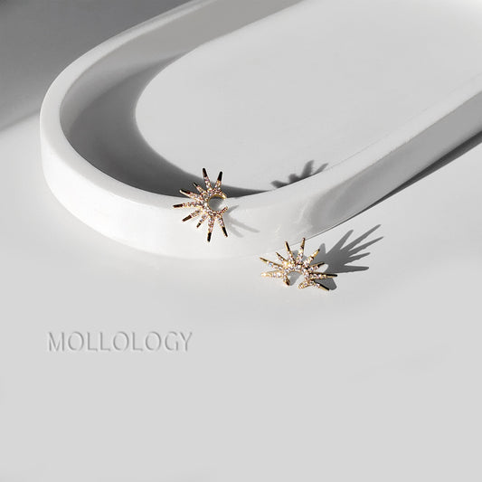 Dainty gold sunburst earrings featuring a radiant starburst floral design with sparkling CZ accents. Mid-century inspired fan earrings, perfect for bridal and bridesmaid jewelry, weddings, special occasions, or elegant everyday wear. A timeless gold statement and beautiful gift for her.