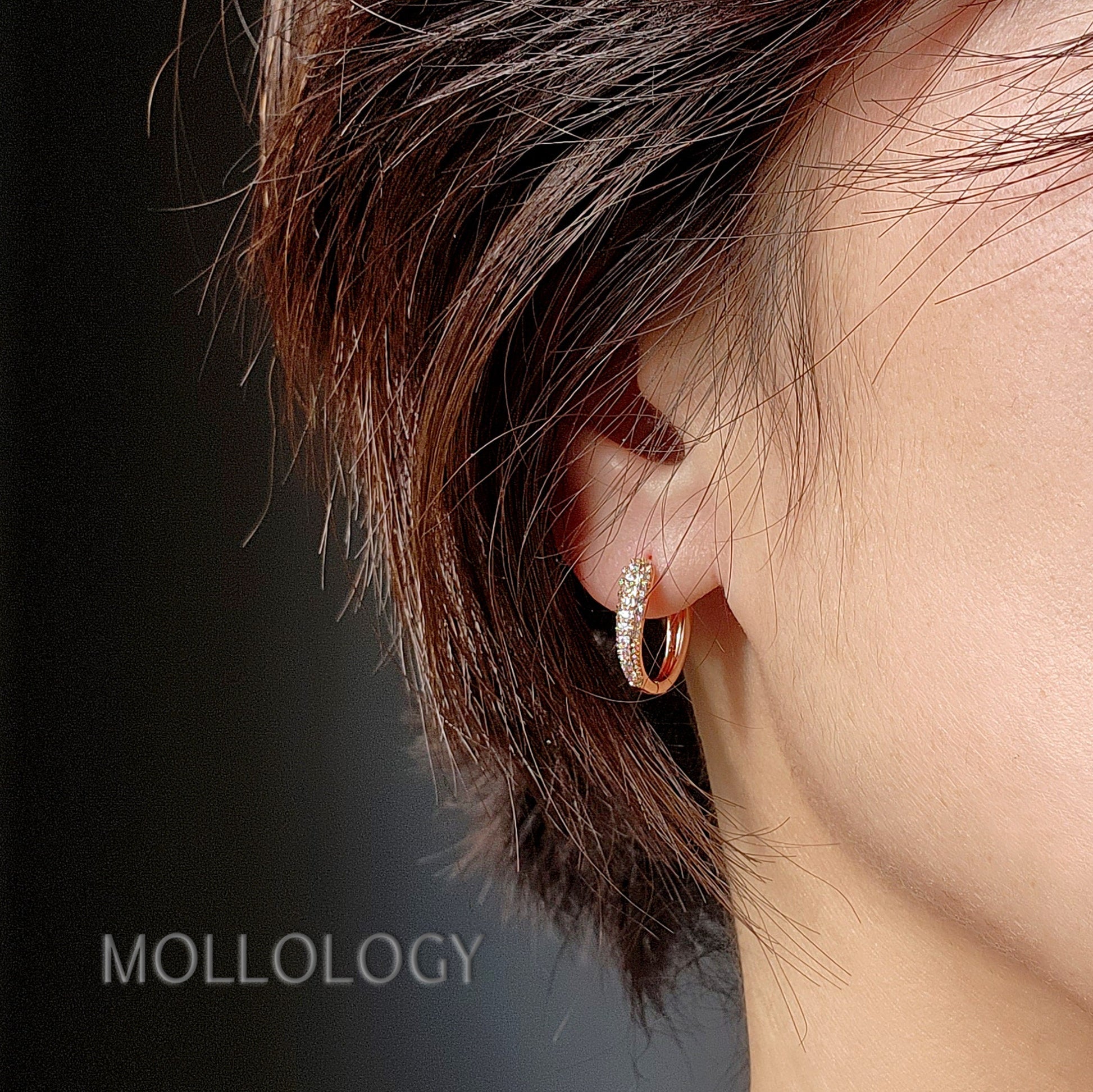 Delicate rose gold huggie hoop earrings with sparkling pavé cubic zirconia. Minimalist, dainty, and lightweight—perfect small hoops for everyday wear, cartilage piercings, or stacking. Timeless thin hoop earrings in rose gold or white gold.
