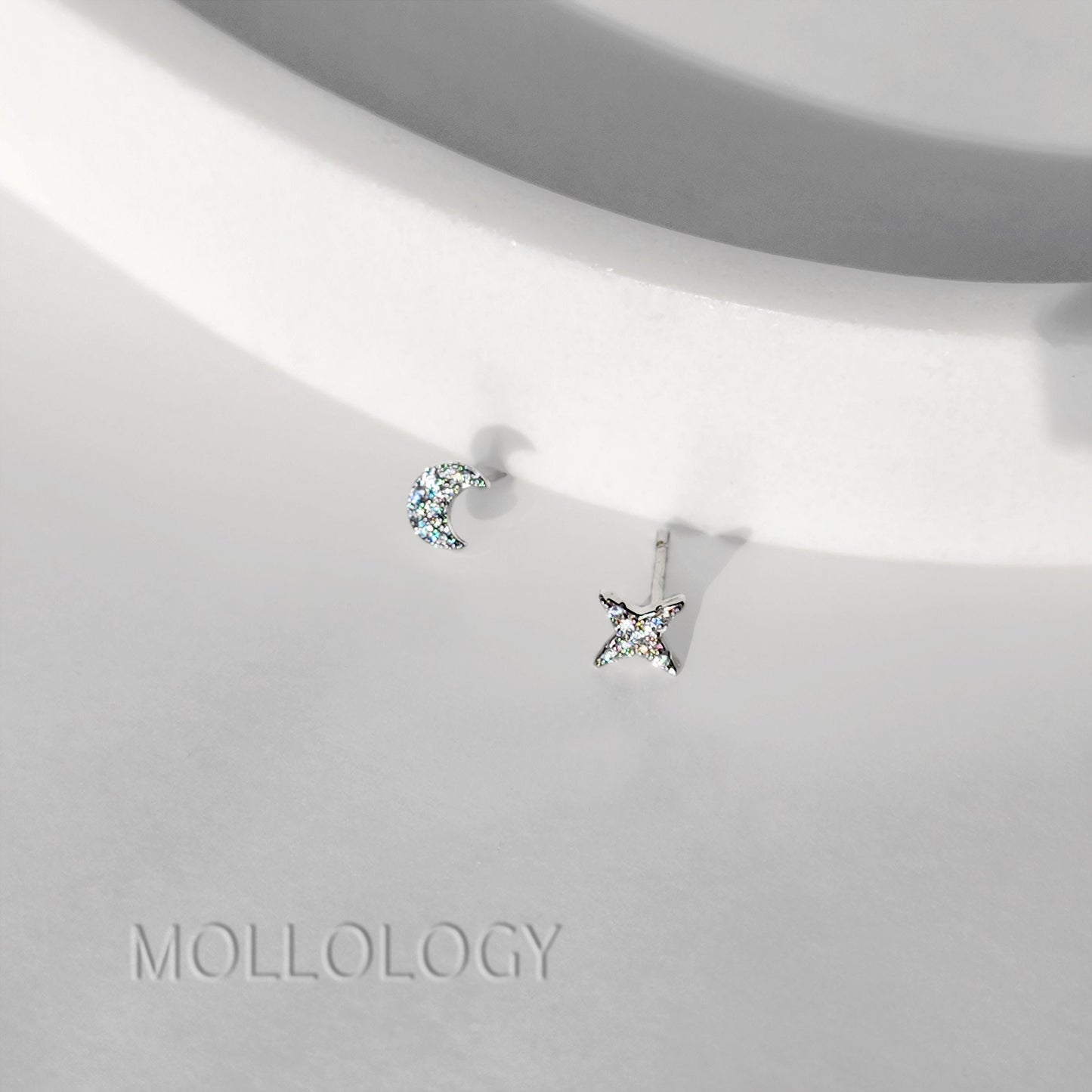 These Tiny Star Moon Earrings feature petite crescent moon and star studs with pavé CZ, creating a minimalist look that still catches the light. Designed for everyday wear, these tiny stud earrings are lightweight, comfortable, and perfect for second piercings or delicate stacking.

These dainty star moon earrings make a sweet gift for her for birthdays, holidays, or just because. Ideal for anyone who loves minimalist earrings, celestial jewelry, and tiny studs with a subtle touch of sparkle.