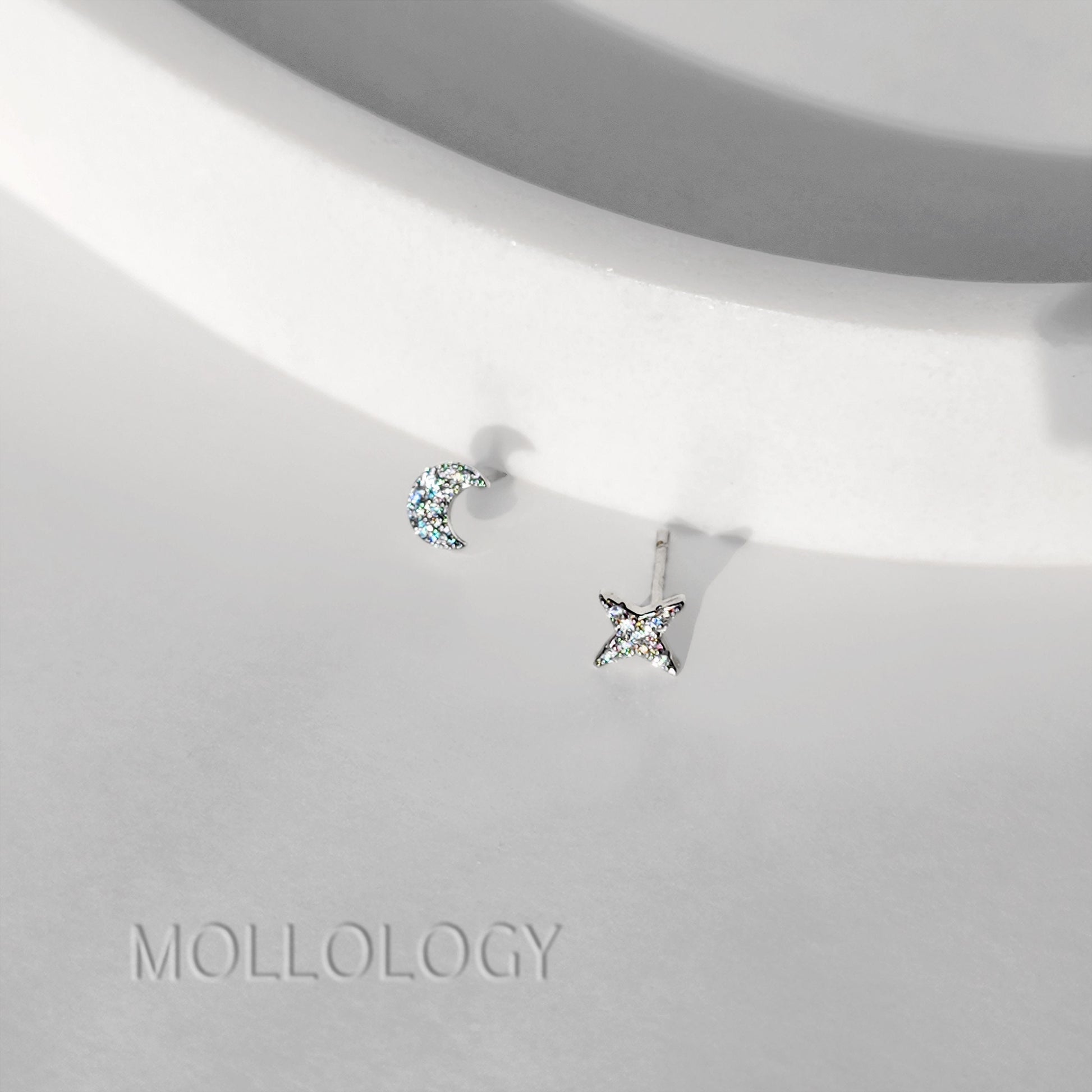 These Tiny Star Moon Earrings feature petite crescent moon and star studs with pavé CZ, creating a minimalist look that still catches the light. Designed for everyday wear, these tiny stud earrings are lightweight, comfortable, and perfect for second piercings or delicate stacking.

These dainty star moon earrings make a sweet gift for her for birthdays, holidays, or just because. Ideal for anyone who loves minimalist earrings, celestial jewelry, and tiny studs with a subtle touch of sparkle.